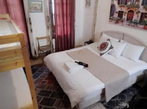 Uma cama ou camas num quarto em La Casetta