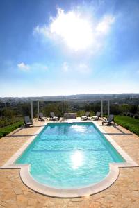 The swimming pool at or close to Antica Aia B&B