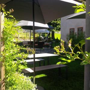 Zahrada ubytování Casa Tödi Restaurant Hotel