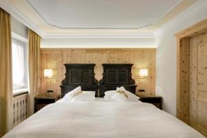 Posteľ alebo postele v izbe v ubytovaní Hotel La Perla: The Leading Hotels of the World
