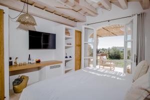 Postel nebo postele na pokoji v ubytování Torre Vella Fontenille Menorca