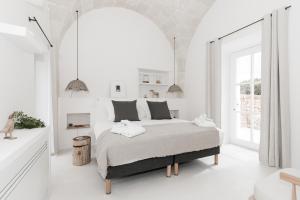 Postel nebo postele na pokoji v ubytování Torre Vella Fontenille Menorca