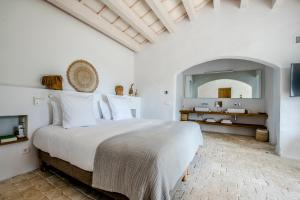 Postel nebo postele na pokoji v ubytování Torre Vella Fontenille Menorca