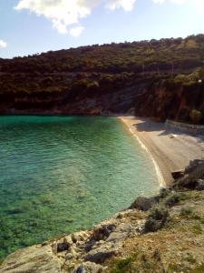 a view of a beach with a sandy shore at La Casa Di Nonna in Koríthion