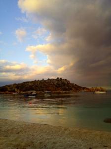 a small island in the middle of a body of water at La Casa Di Nonna in Koríthion