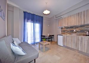 Kuchyň nebo kuchyňský kout v ubytování Alexandros SeaView Suites