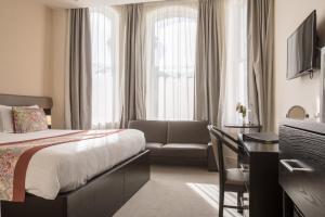 TV a/nebo společenská místnost v ubytování Mannin Hotel