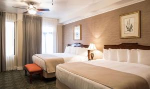 Ένα ή περισσότερα κρεβάτια σε δωμάτιο στο Hotel El Capitan