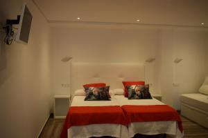 Cama ou camas em um quarto em Hotel Restaurante Racha