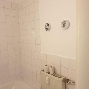 Ett badrum på Apartment Krefeld City