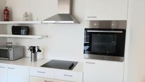 Kuchyň nebo kuchyňský kout v ubytování 19 Brussels Expo