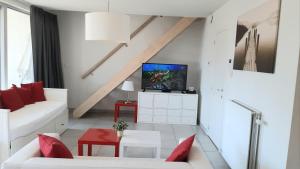 TV a/nebo společenská místnost v ubytování 19 Brussels Expo