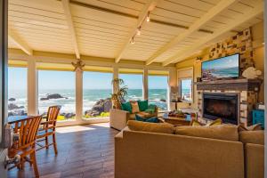 a living room with a view of the ocean at Surfscape Beach House, Private Beach & Ocean views in Bodega Bay