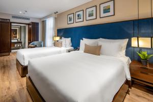 Uma cama ou camas num quarto em Minh Toan SAFI Ocean Hotel