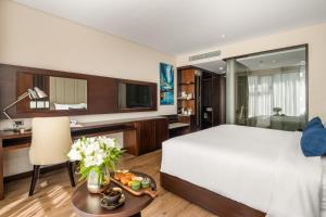 Uma cama ou camas num quarto em Minh Toan SAFI Ocean Hotel