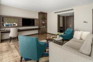 Uma televisão e/ou sistema de entretenimento em Minh Toan SAFI Ocean Hotel