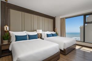 Uma cama ou camas num quarto em Minh Toan SAFI Ocean Hotel