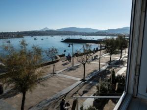 a view of a lake from a window at Paseo Butrón by Basquelidays in Hondarribia