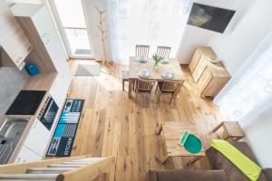 TV a/nebo společenská místnost v ubytování Alpen-Hostel - Apartment Morgen- und Abendsonne mit Motorradvermietung