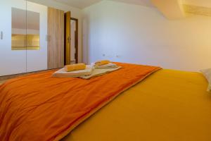 Posteľ alebo postele v izbe v ubytovaní Apartment LINDA