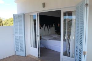 Postel nebo postele na pokoji v ubytování Casa del Mar