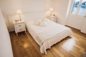 Postel nebo postele na pokoji v ubytování La Casa Isabella