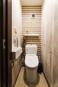 a bathroom with a toilet and a sink at Funabashi-honchou 4choume kodate #MF1 in Funabashi