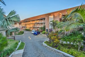 a parking lot in front of a hotel at 302 Kenwyn on Sea- Luxury Beachfront Getaway in Ballito