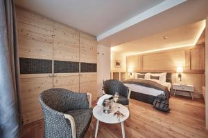 Krevet ili kreveti u jedinici u okviru objekta Goldene Rose Karthaus a member of Small Luxury Hotels of the World