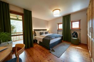 Krevet ili kreveti u jedinici u okviru objekta Goldene Rose Karthaus a member of Small Luxury Hotels of the World