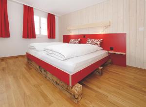 Postel nebo postele na pokoji v ubytování Alpinhotel Bort