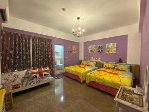 Postel nebo postele na pokoji v ubytování Dreamer 24 B&B