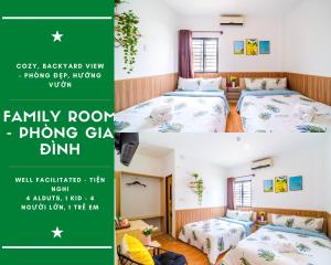 a room in a house with two beds and a green banner at Dreamy Sky - Airport View Boutique Hotel in Da Nang