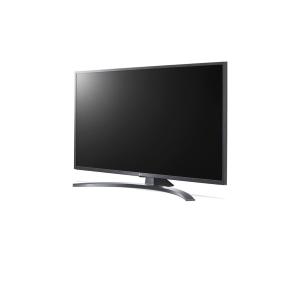 a flat screen tv sitting on a stand at Christaras Apartments in Vourvourou