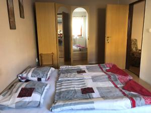 Postel nebo postele na pokoji v ubytování Apartmány Neronet