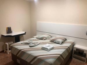 Ένα ή περισσότερα κρεβάτια σε δωμάτιο στο Hotel City II +22 φωτογραφίες