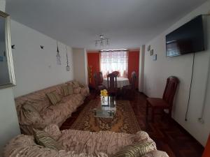 Кът за сядане в Apartments & Rooms Helena