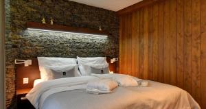 Posteľ alebo postele v izbe v ubytovaní WILLIAM Congress&Wellness Mountain HOTEL ****