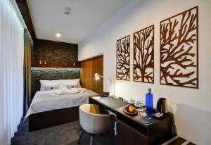Posteľ alebo postele v izbe v ubytovaní WILLIAM Congress&Wellness Mountain HOTEL ****