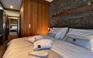 Posteľ alebo postele v izbe v ubytovaní WILLIAM Congress&Wellness Mountain HOTEL ****