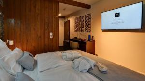Posteľ alebo postele v izbe v ubytovaní WILLIAM Congress&Wellness Mountain HOTEL ****