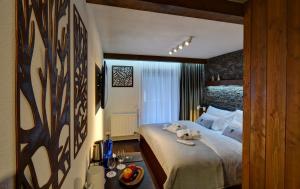 Posteľ alebo postele v izbe v ubytovaní WILLIAM Congress&Wellness Mountain HOTEL ****