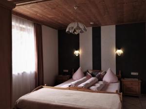 Posteľ alebo postele v izbe v ubytovaní Haus Goldeck