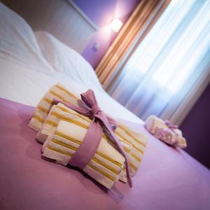 Posteľ alebo postele v izbe v ubytovaní Residenza Palazzo Negri