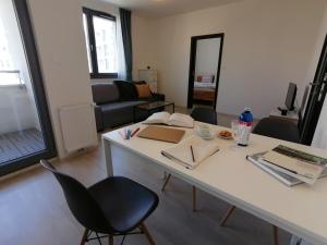 Posezení v ubytování Prima Family Apartments