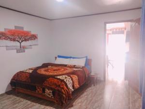Postel nebo postele na pokoji v ubytování B&B Nuwara eliya
