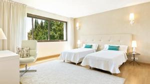 Cama ou camas em um quarto em Villa Marina