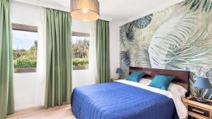 Cama ou camas em um quarto em Villa Marina