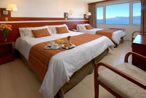 Postel nebo postele na pokoji v ubytování Hotel Tirol