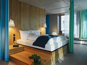 Ліжко або ліжка в номері 25hours Hotel Langstrasse